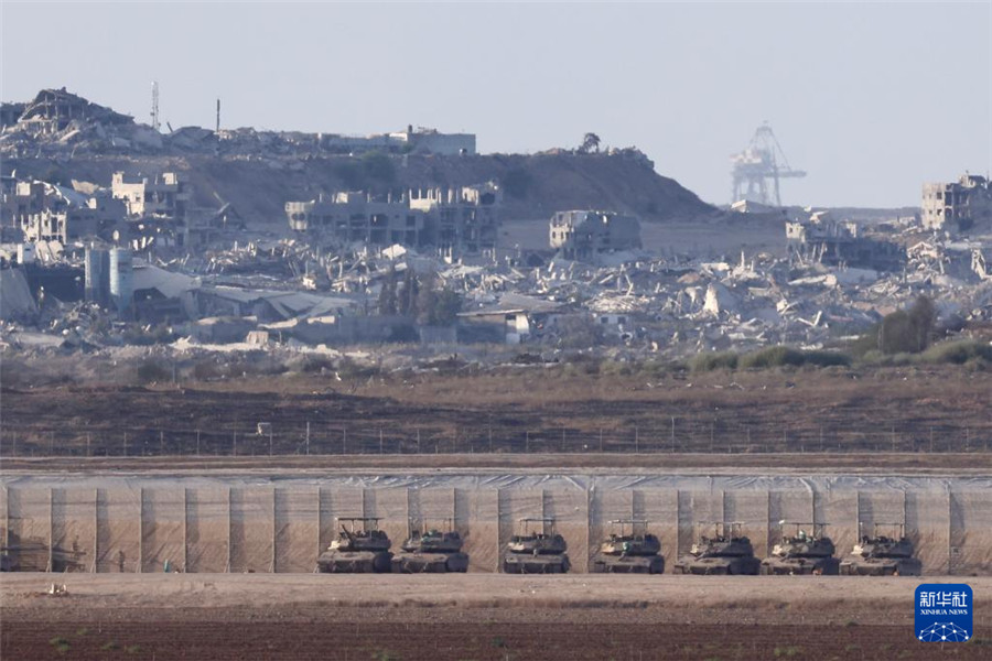 这是9月16日拍摄的位于加沙边境以色列一侧的以军部队。新华社发（贾马尔·阿瓦德摄）