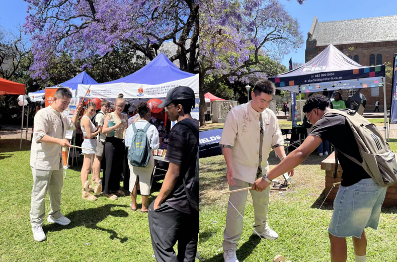 南非中国文化中心孔子课堂教师杨煜在教南非学生抖空竹。南非中国文化中心孔子课堂供图